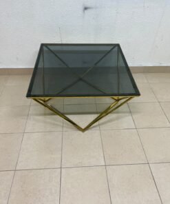 A modern, square coffee table featuring a dark or smoked glass top and a cohesive, diamond-inspired geometric base made of metal or polished gold-tone steel. - Image 10