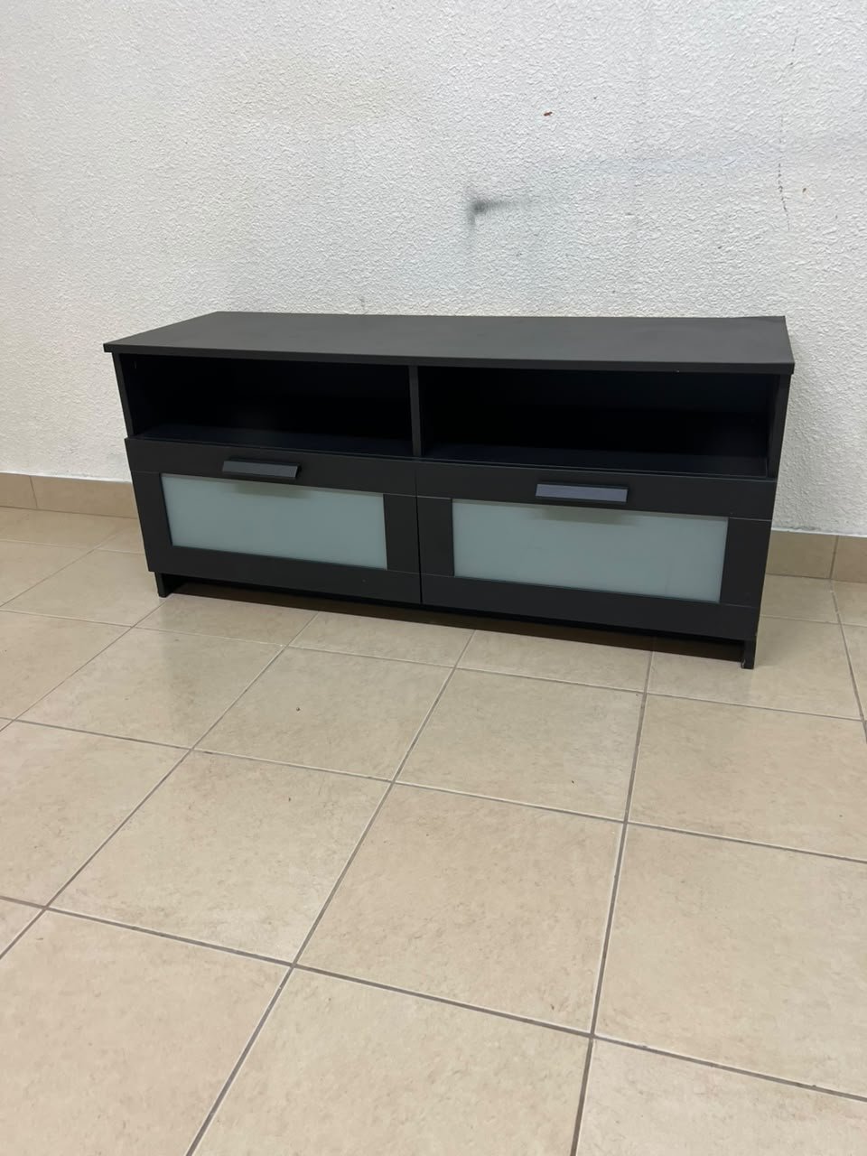 This is an IKEA BRIMNES TV bench in black, featuring open shelves and two storage drawers with frosted glass fronts. - Image 2
