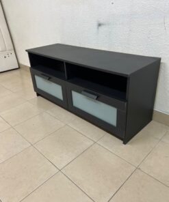 This is an IKEA BRIMNES TV bench in black, featuring open shelves and two storage drawers with frosted glass fronts.