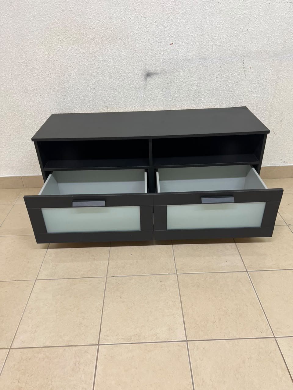 This is an IKEA BRIMNES TV bench in black, featuring open shelves and two storage drawers with frosted glass fronts. - Image 9