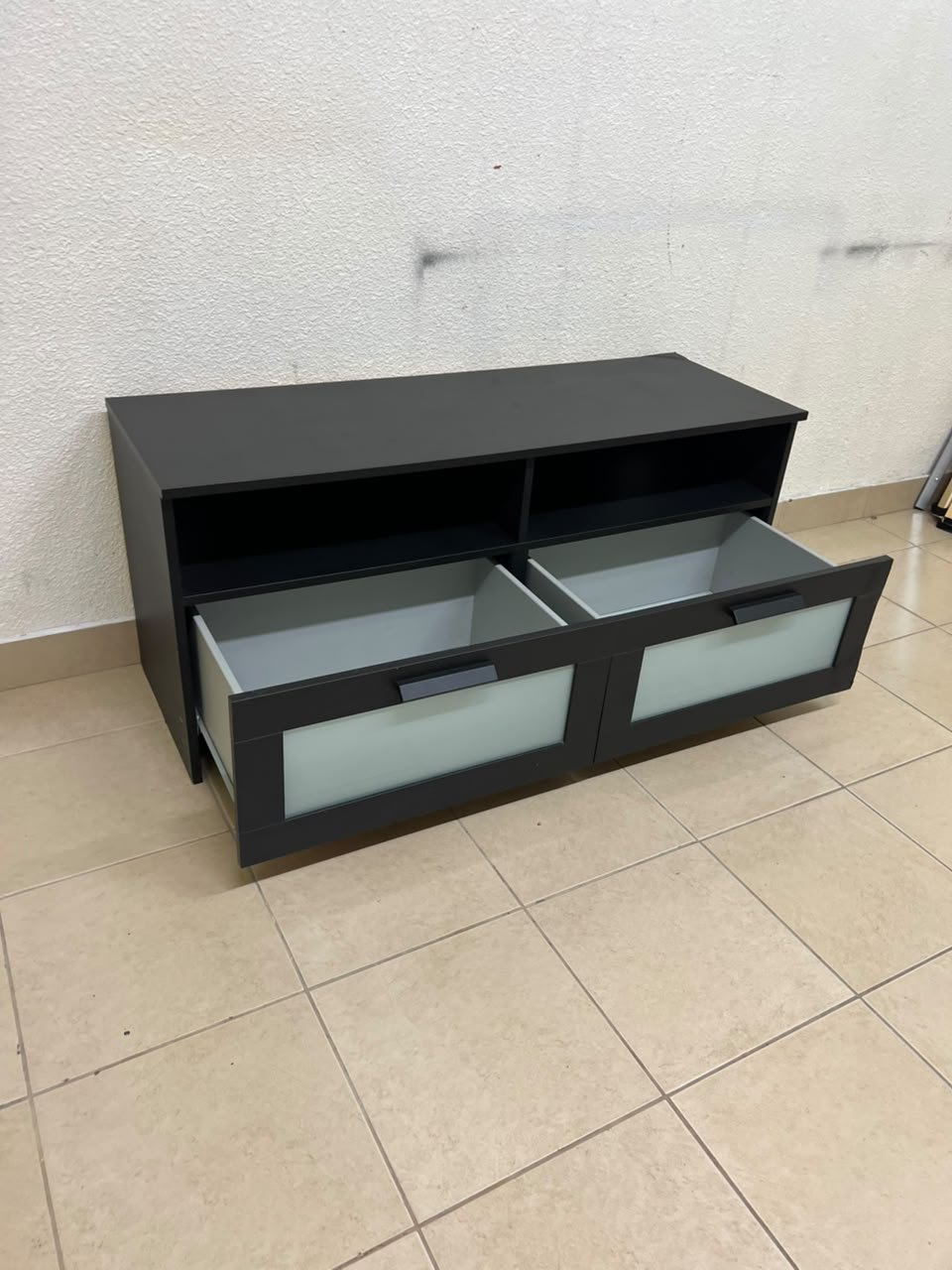 This is an IKEA BRIMNES TV bench in black, featuring open shelves and two storage drawers with frosted glass fronts. - Image 3