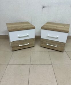Two bedside tables (nightstands) with two drawers, featuring a design that combines white and light wood (oak or Sonoma finish) with prominent white handles.