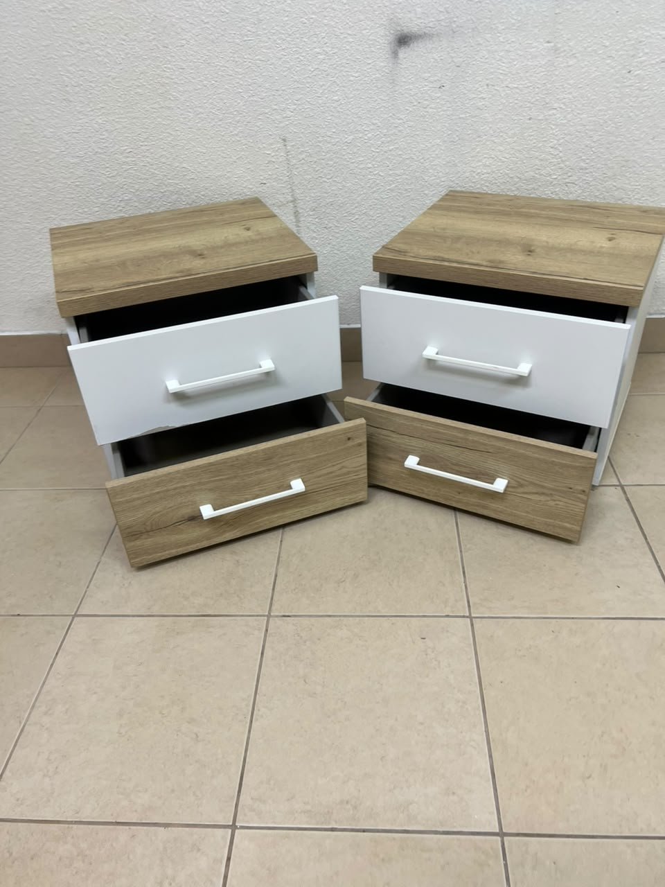 Two bedside tables (nightstands) with two drawers, featuring a design that combines white and light wood (oak or Sonoma finish) with prominent white handles. - Image 9
