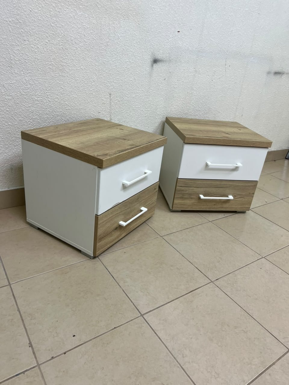Two bedside tables (nightstands) with two drawers, featuring a design that combines white and light wood (oak or Sonoma finish) with prominent white handles. - Image 11