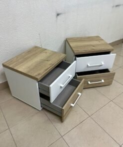 Two bedside tables (nightstands) with two drawers, featuring a design that combines white and light wood (oak or Sonoma finish) with prominent white handles. - Image 4