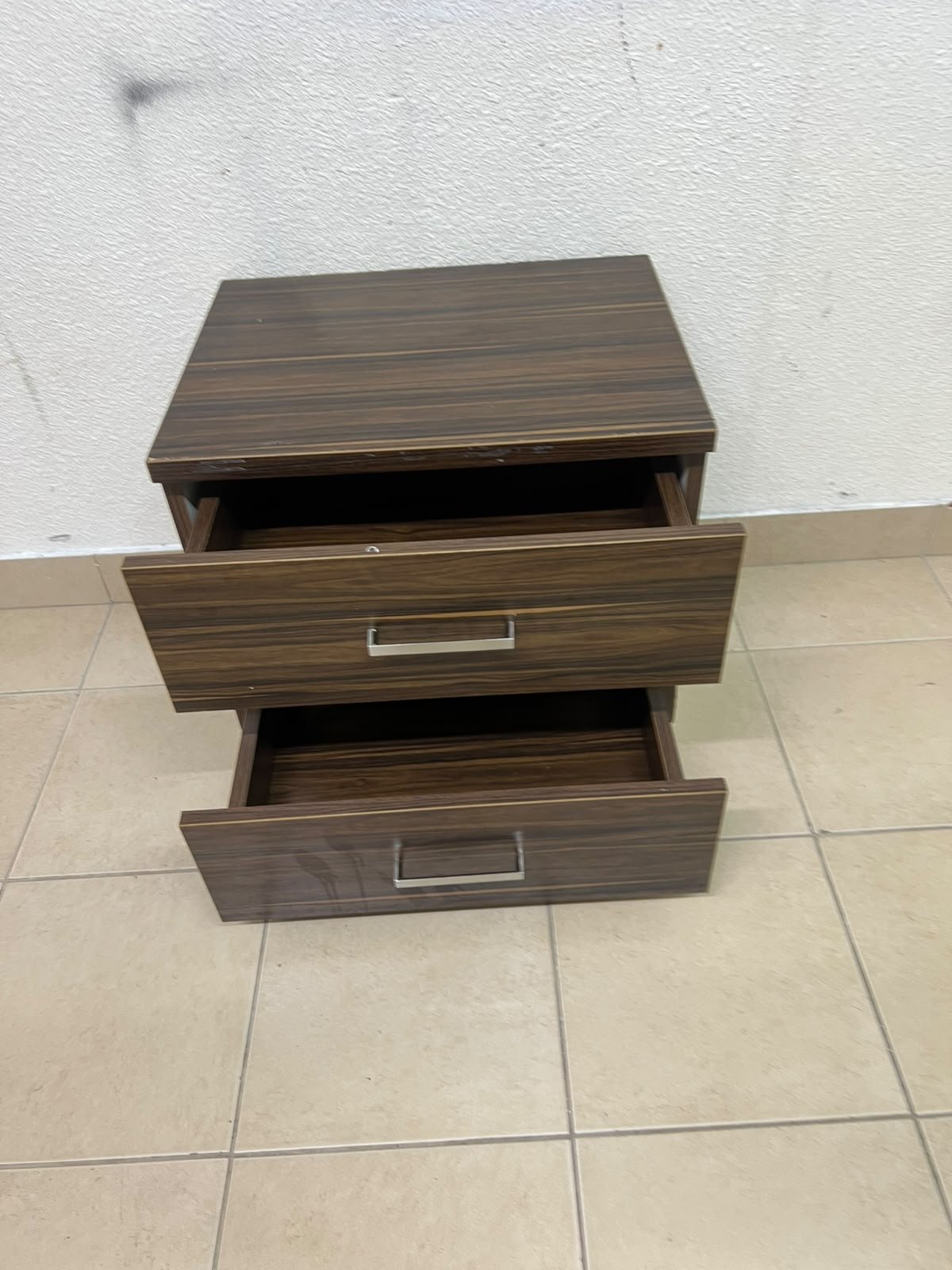 wooden bedside table with two drawers and metal handles. - Image 6