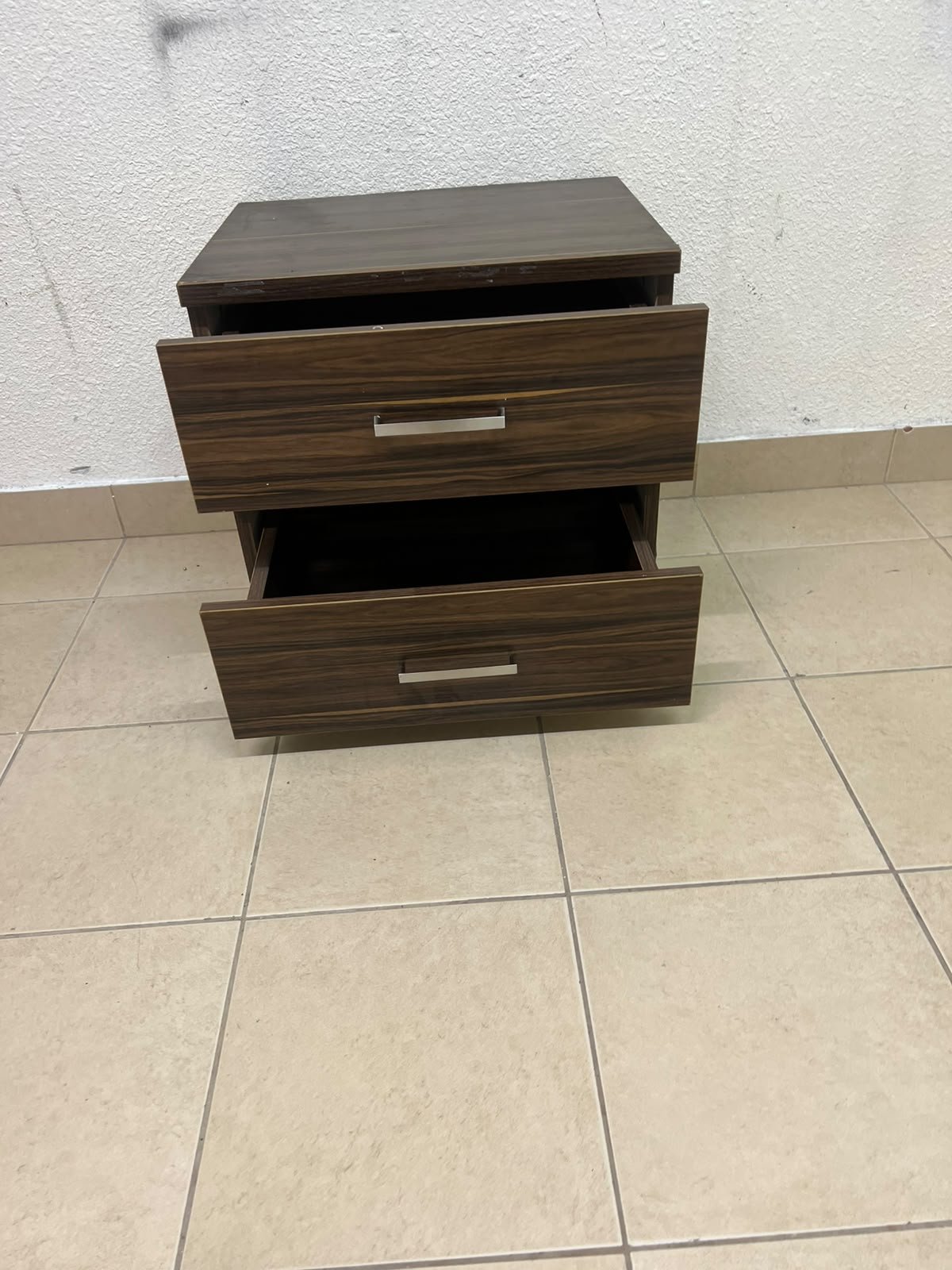 wooden bedside table with two drawers and metal handles. - Image 3