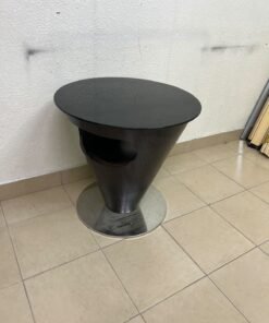 A modern, cone-shaped coffee or side table featuring a circular metal base and a round tabletop. It includes an integrated side opening—suitable for use as a cup holder or small storage unit—and boasts a sleek, streamlined design that is ideal for compact spaces. - Image 10