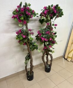An artificial Bougainvillea tree featuring attractive pink blossoms and green foliage, distinguished by natural, expertly braided wooden trunks and set in black plastic pots. - Image 7
