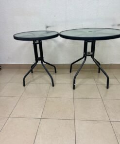 A round garden table featuring a black metal frame and a tempered glass top, suitable for outdoor use on balconies or in gardens. - Image 4