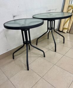 A round garden table featuring a black metal frame and a tempered glass top, suitable for outdoor use on balconies or in gardens. - Image 5