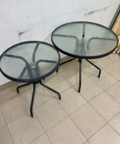A round garden table featuring a black metal frame and a tempered glass top, suitable for outdoor use on balconies or in gardens. - Image 8