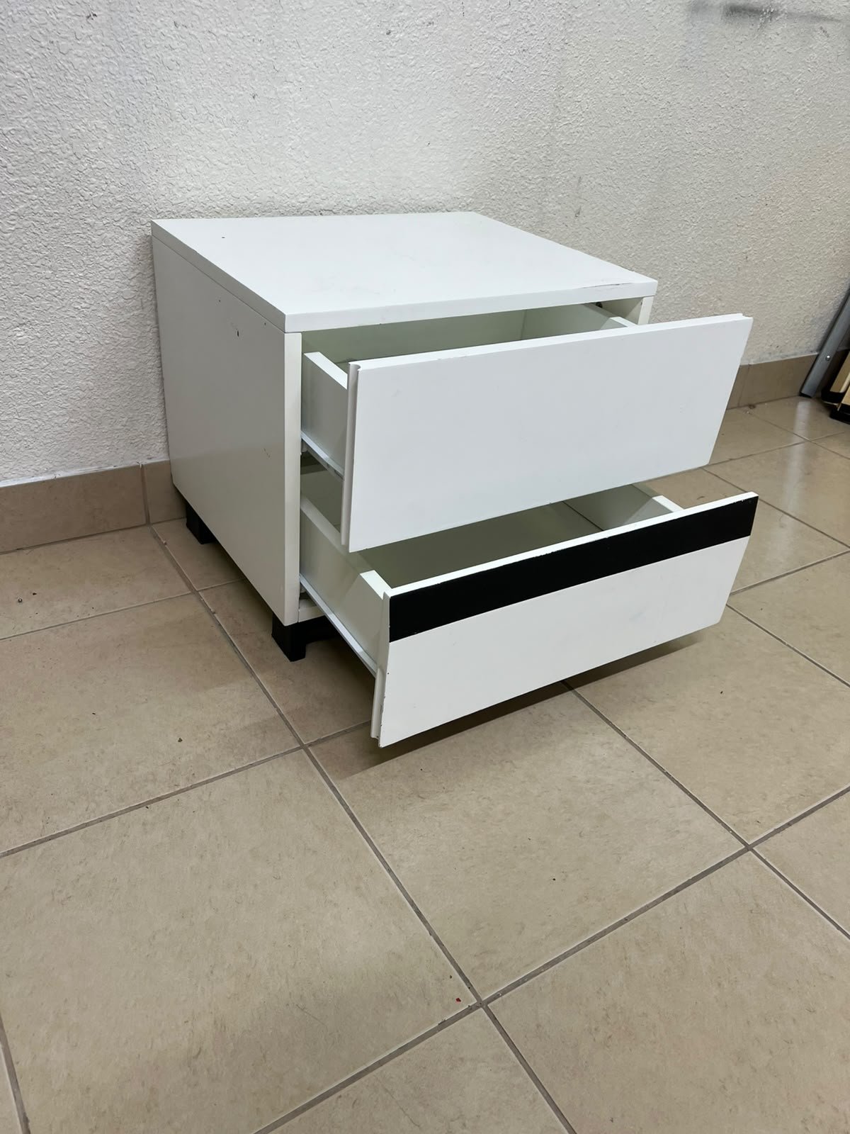 A modern-design bedside table (nightstand) made of engineered wood in white, featuring contrasting black lines. - Image 4