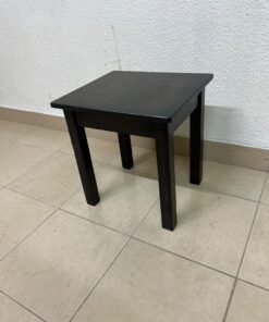 A small, square wooden side table with a dark brown or black finish, featuring four straight legs.
