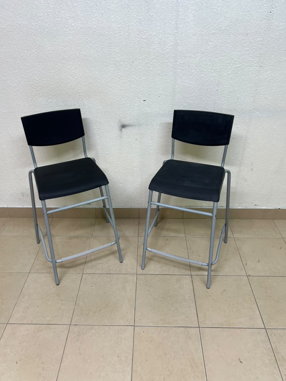 IKEA STIG bar stools, featuring a black seat and backrest with a grey metal frame. - Image 7