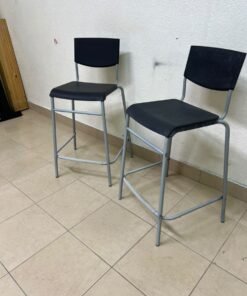 IKEA STIG bar stools, featuring a black seat and backrest with a grey metal frame. - Image 10