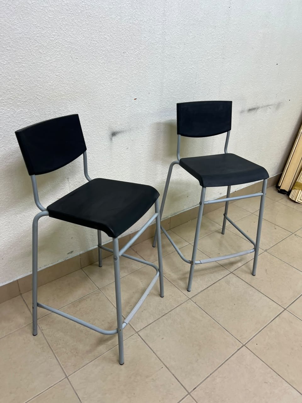 IKEA STIG bar stools, featuring a black seat and backrest with a grey metal frame. - Image 11