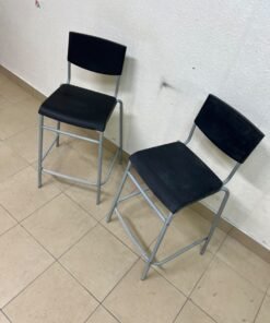 IKEA STIG bar stools, featuring a black seat and backrest with a grey metal frame. - Image 5