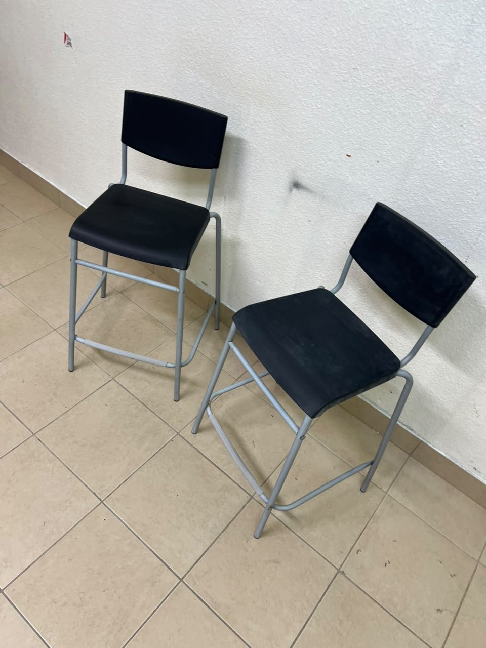 IKEA STIG bar stools, featuring a black seat and backrest with a grey metal frame. - Image 5