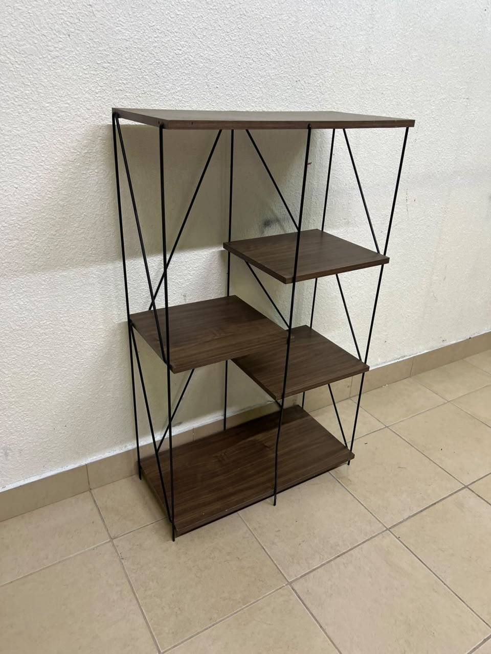 Multi-tiered open shelving units or similar industrial storage racks featuring black metal frames and walnut-colored wooden shelves. - Image 2