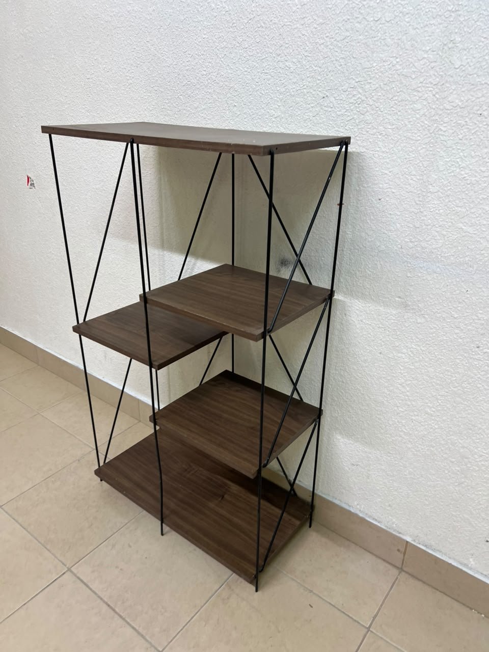 Multi-tiered open shelving units or similar industrial storage racks featuring black metal frames and walnut-colored wooden shelves. - Image 3
