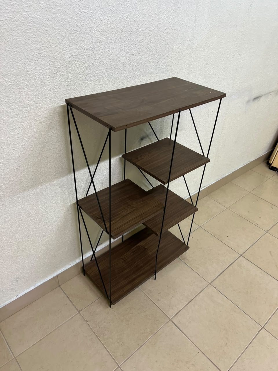 Multi-tiered open shelving units or similar industrial storage racks featuring black metal frames and walnut-colored wooden shelves. - Image 5