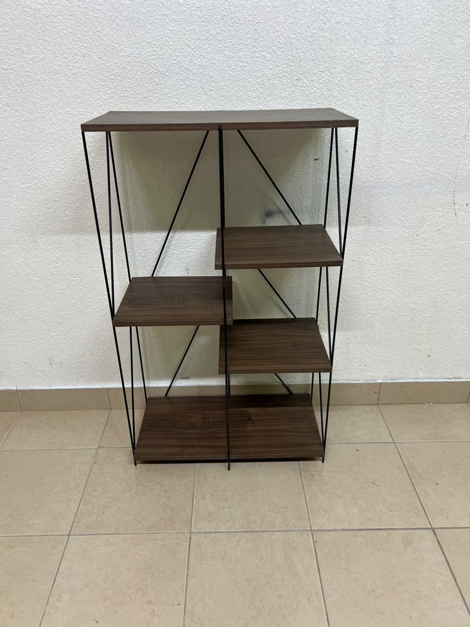 Multi-tiered open shelving units or similar industrial storage racks featuring black metal frames and walnut-colored wooden shelves. - Image 7