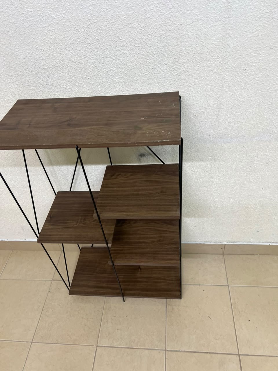 Multi-tiered open shelving units or similar industrial storage racks featuring black metal frames and walnut-colored wooden shelves. - Image 9
