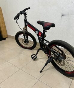 A 20-inch "Hummer"-branded mountain bike featuring a black and red color scheme; it appears to be equipped with a carbon steel or alloy frame, a front suspension system, and dual disc brakes. - Image 9