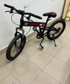 A 20-inch "Hummer"-branded mountain bike featuring a black and red color scheme; it appears to be equipped with a carbon steel or alloy frame, a front suspension system, and dual disc brakes. - Image 3