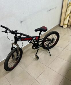 A 20-inch "Hummer"-branded mountain bike featuring a black and red color scheme; it appears to be equipped with a carbon steel or alloy frame, a front suspension system, and dual disc brakes. - Image 7