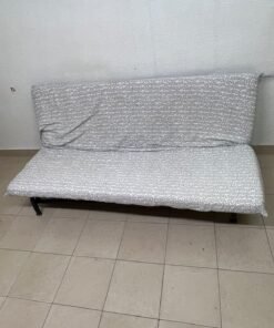 A foldable metal sofa bed (converting into a bed)—the famous IKEA NYHAMN model—featuring a grey-and-white patterned fabric cover and a black frame. - Image 5