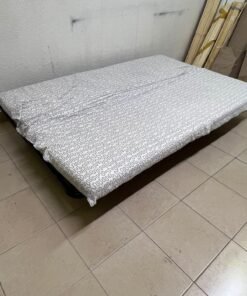 A foldable metal sofa bed (converting into a bed)—the famous IKEA NYHAMN model—featuring a grey-and-white patterned fabric cover and a black frame. - Image 6