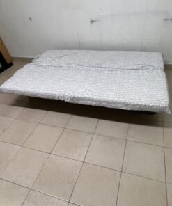 A foldable metal sofa bed (converting into a bed)—the famous IKEA NYHAMN model—featuring a grey-and-white patterned fabric cover and a black frame. - Image 8