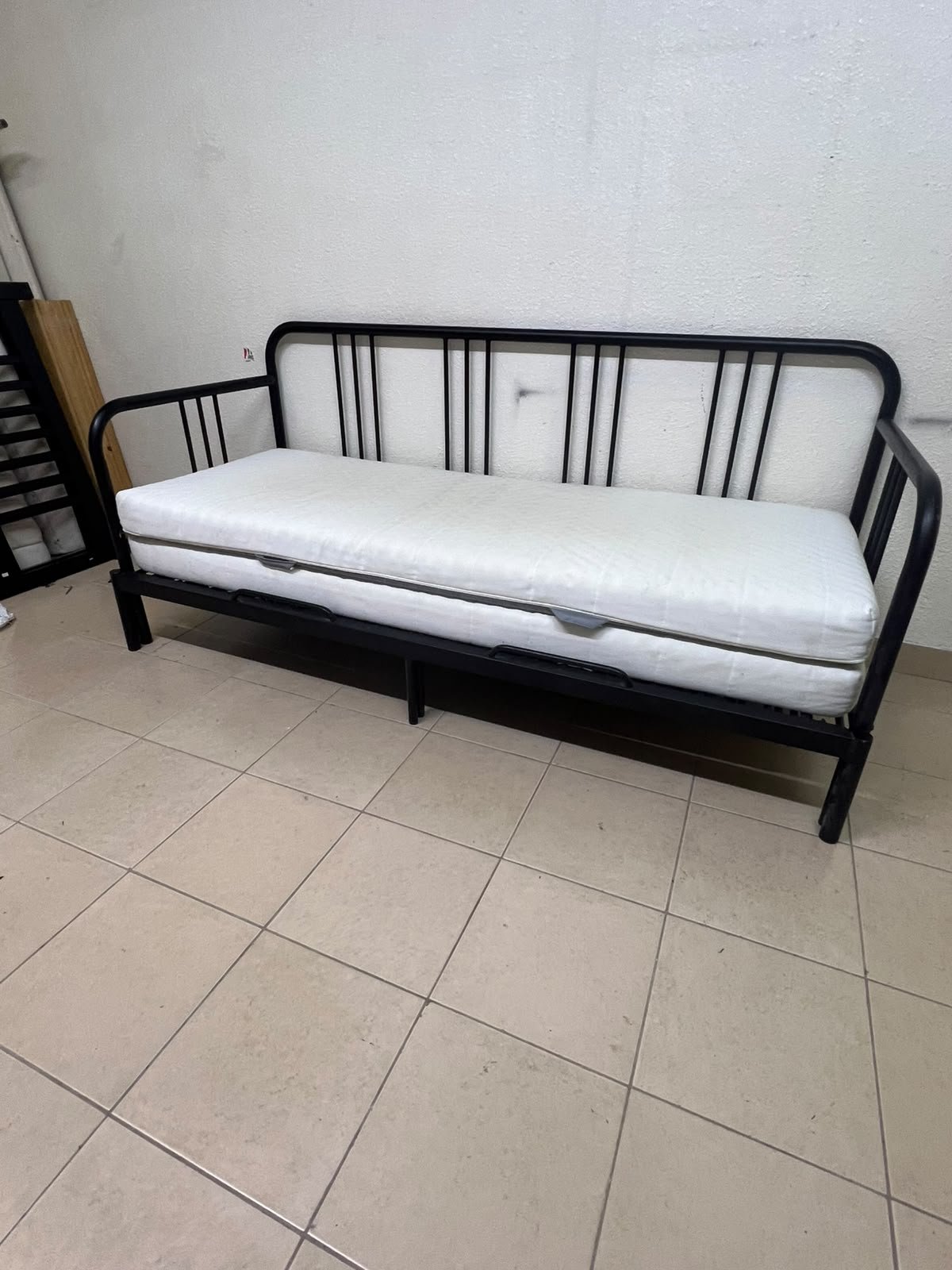 This is a black metal daybed that extends to convert into a double bed or a sofa; it closely resembles the IKEA FYRESDAL daybed frame (80x200 cm). - Image 2