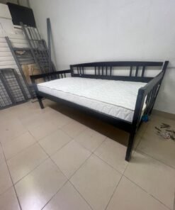 The image appears to show a dark black wooden daybed, featuring rails on three sides and a standard double size with a white mattress. - Image 11