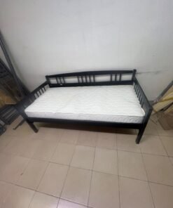 The image appears to show a dark black wooden daybed, featuring rails on three sides and a standard double size with a white mattress. - Image 8