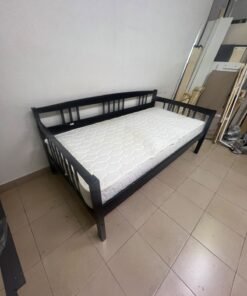 The image appears to show a dark black wooden daybed, featuring rails on three sides and a standard double size with a white mattress. - Image 6
