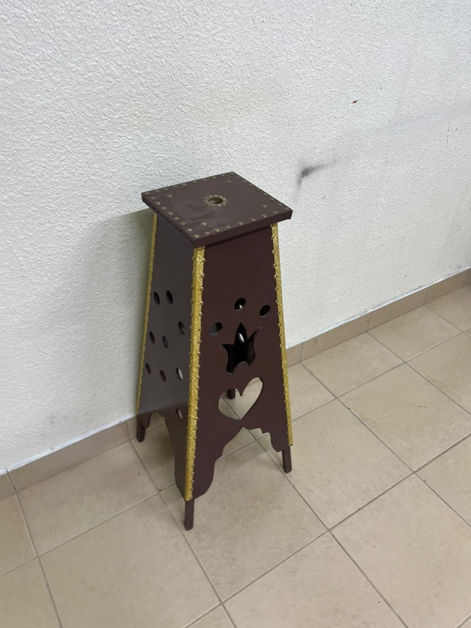 A tall wooden garment incense burner (incense stand) featuring a tower or pyramid design; it is used to scent abayas, clothing, and fabrics by hanging or placing them over the burner, allowing them to absorb the fragrance of incense and oud. - Image 6