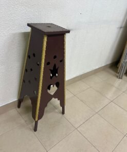 A tall wooden garment incense burner (incense stand) featuring a tower or pyramid design; it is used to scent abayas, clothing, and fabrics by hanging or placing them over the burner, allowing them to absorb the fragrance of incense and oud.