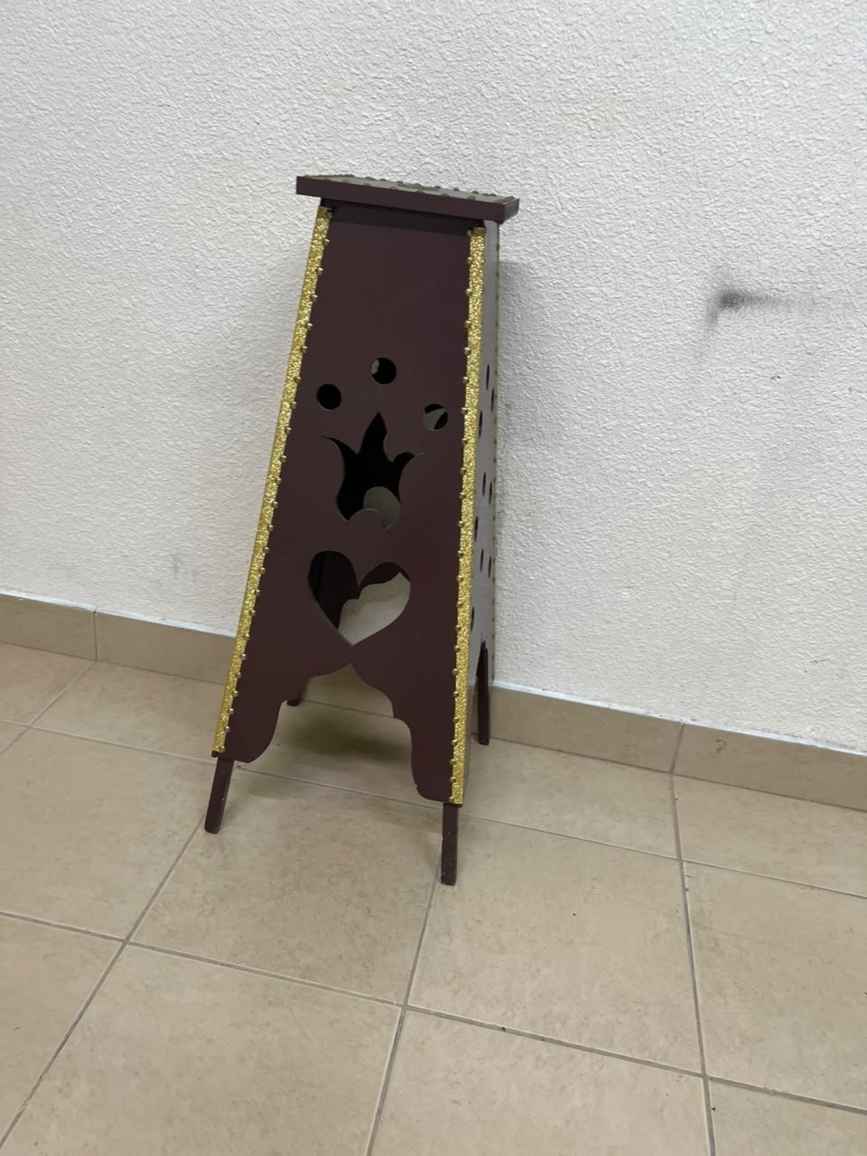 A tall wooden garment incense burner (incense stand) featuring a tower or pyramid design; it is used to scent abayas, clothing, and fabrics by hanging or placing them over the burner, allowing them to absorb the fragrance of incense and oud. - Image 8