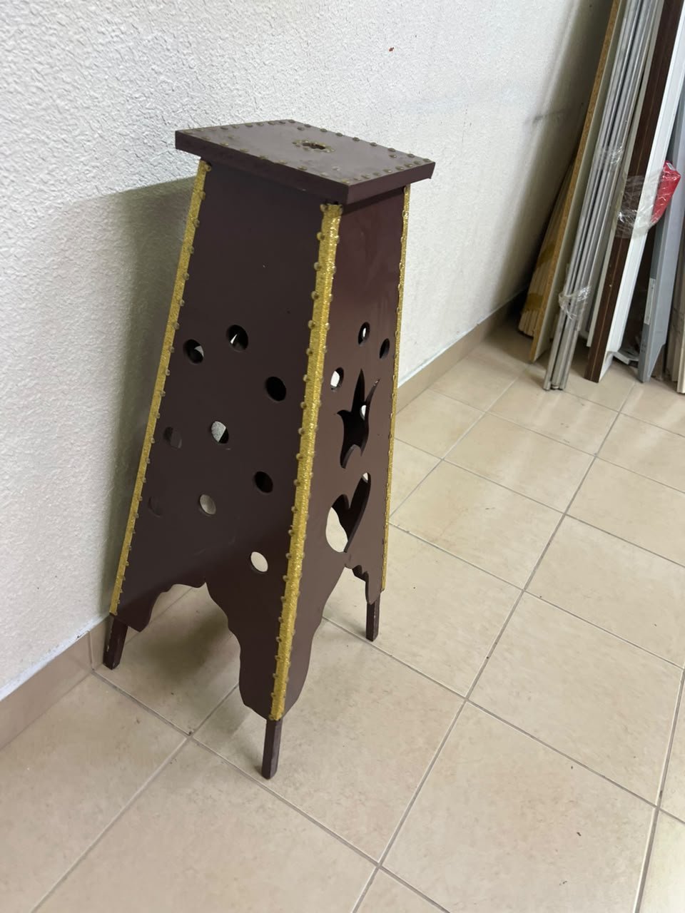A tall wooden garment incense burner (incense stand) featuring a tower or pyramid design; it is used to scent abayas, clothing, and fabrics by hanging or placing them over the burner, allowing them to absorb the fragrance of incense and oud. - Image 9