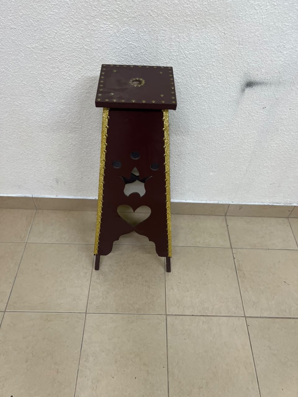A tall wooden garment incense burner (incense stand) featuring a tower or pyramid design; it is used to scent abayas, clothing, and fabrics by hanging or placing them over the burner, allowing them to absorb the fragrance of incense and oud. - Image 10