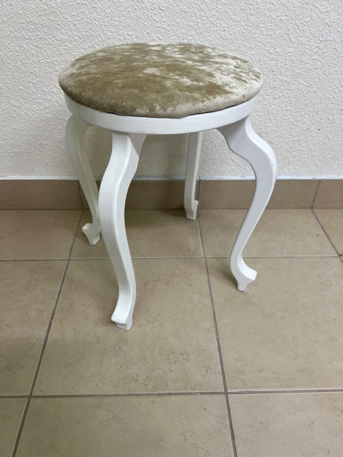 A vanity stool featuring a classic French or "Queen Anne" design, characterized by a white wooden frame with cabriole legs and a round seat upholstered in beige or light-gold velvet fabric. - Image 4