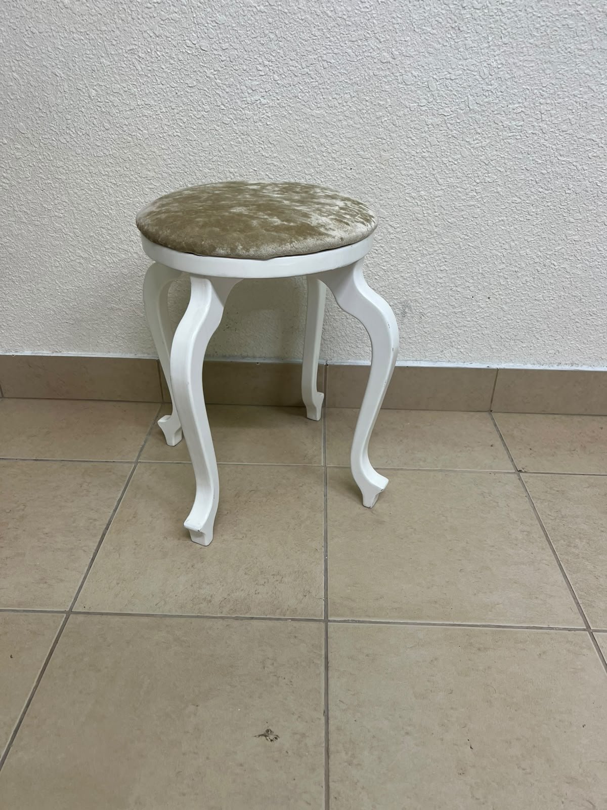 A vanity stool featuring a classic French or "Queen Anne" design, characterized by a white wooden frame with cabriole legs and a round seat upholstered in beige or light-gold velvet fabric. - Image 6