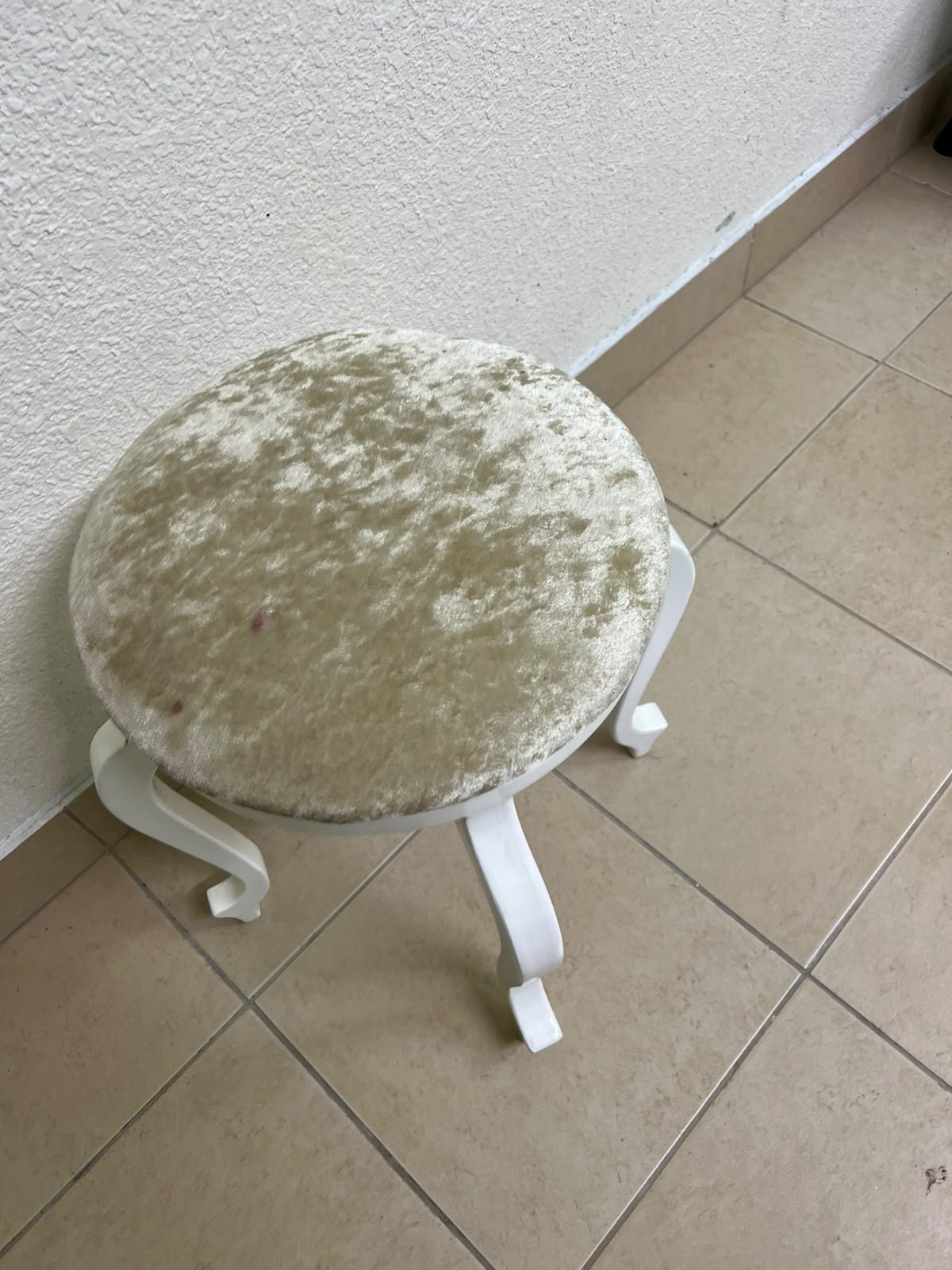 A vanity stool featuring a classic French or "Queen Anne" design, characterized by a white wooden frame with cabriole legs and a round seat upholstered in beige or light-gold velvet fabric. - Image 10