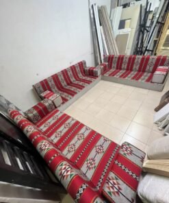 A traditional U-shaped floor seating set (Arabic *majlis*), upholstered in fabric featuring red, heritage-inspired Sadu patterns. - Image 5