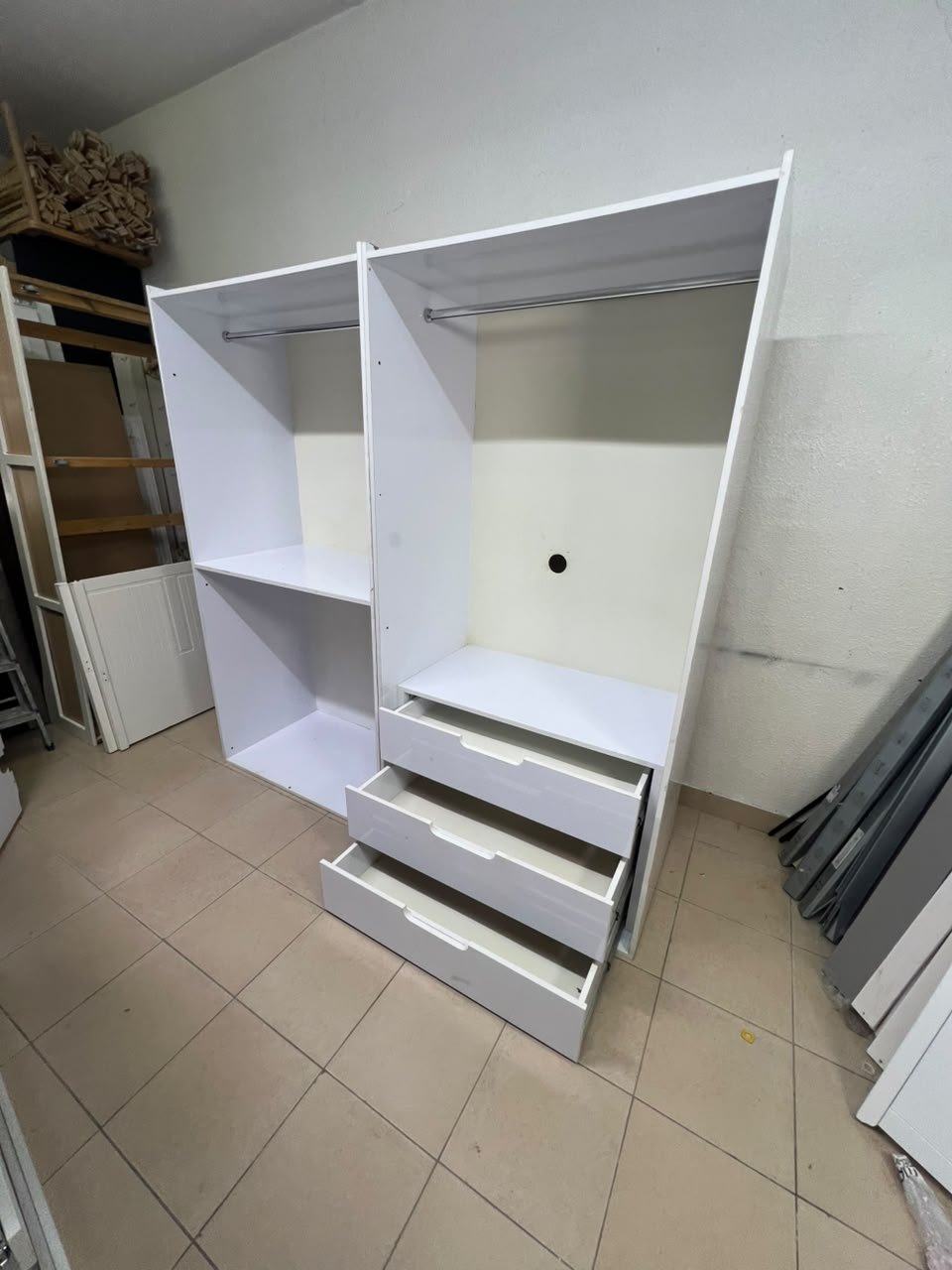 A white open wardrobe unit made of MDF, featuring shelves, drawers, and a clothes rail. - Image 9