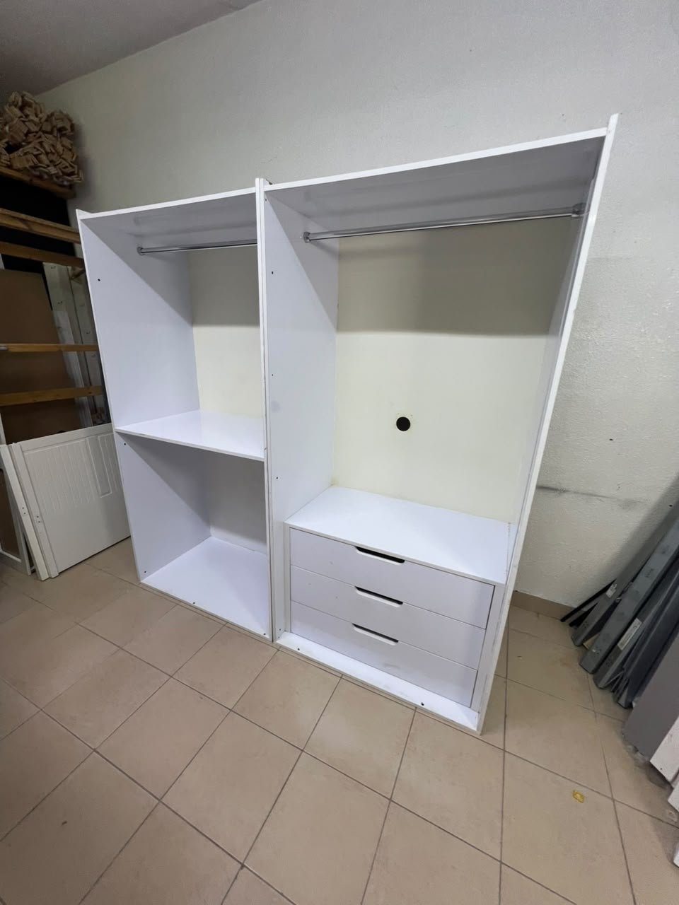 A white open wardrobe unit made of MDF, featuring shelves, drawers, and a clothes rail. - Image 5
