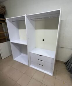 A white open wardrobe unit made of MDF, featuring shelves, drawers, and a clothes rail.